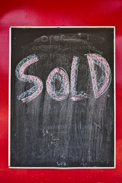 Realtor and buyer at sold home